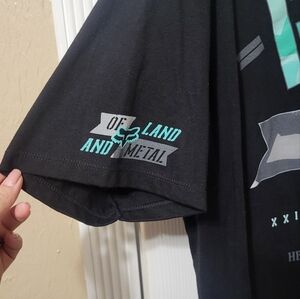 Fox size xl mens black with green and grey letters nwot